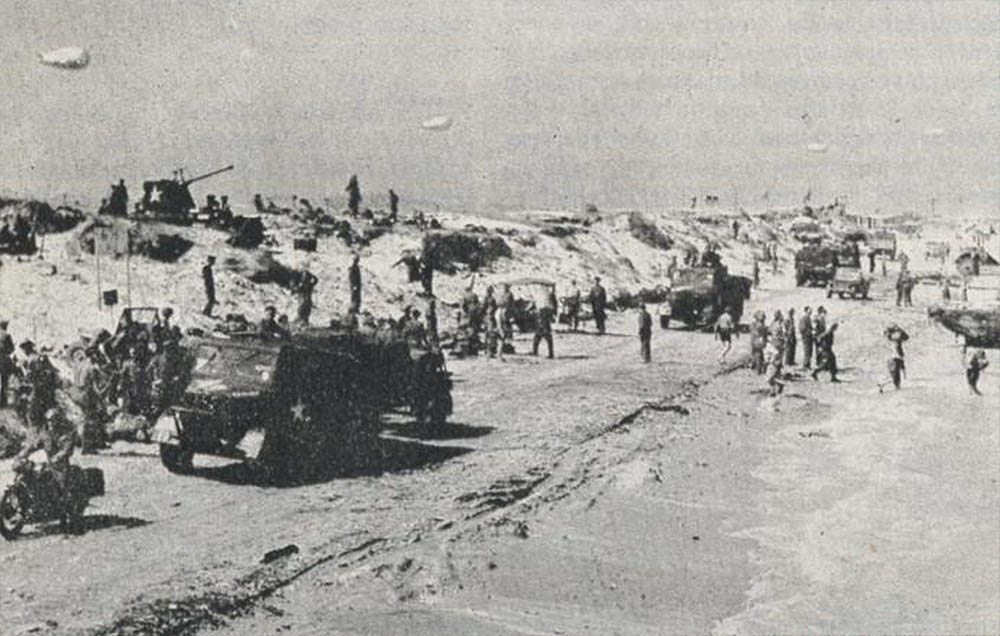 Trucks on Courseulles Beach